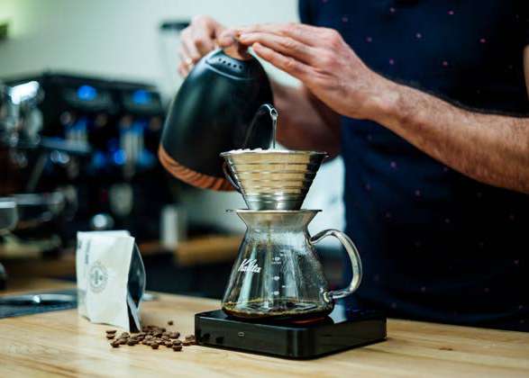 Manual pour-over brewing at Naji